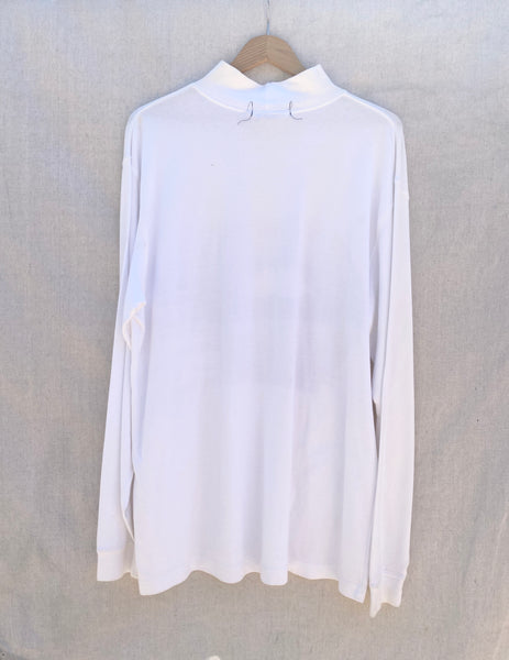 FULL VIEW OF BACK WHITE LONG SLEEVES TEE  WITH MOCK NECK.