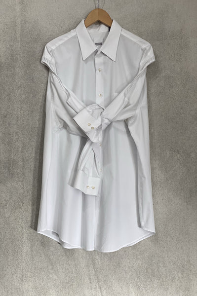 OVERSIZED WHITE BUTTON DOWN SHIRT WITH SLEEVES TIED AT FRONT.