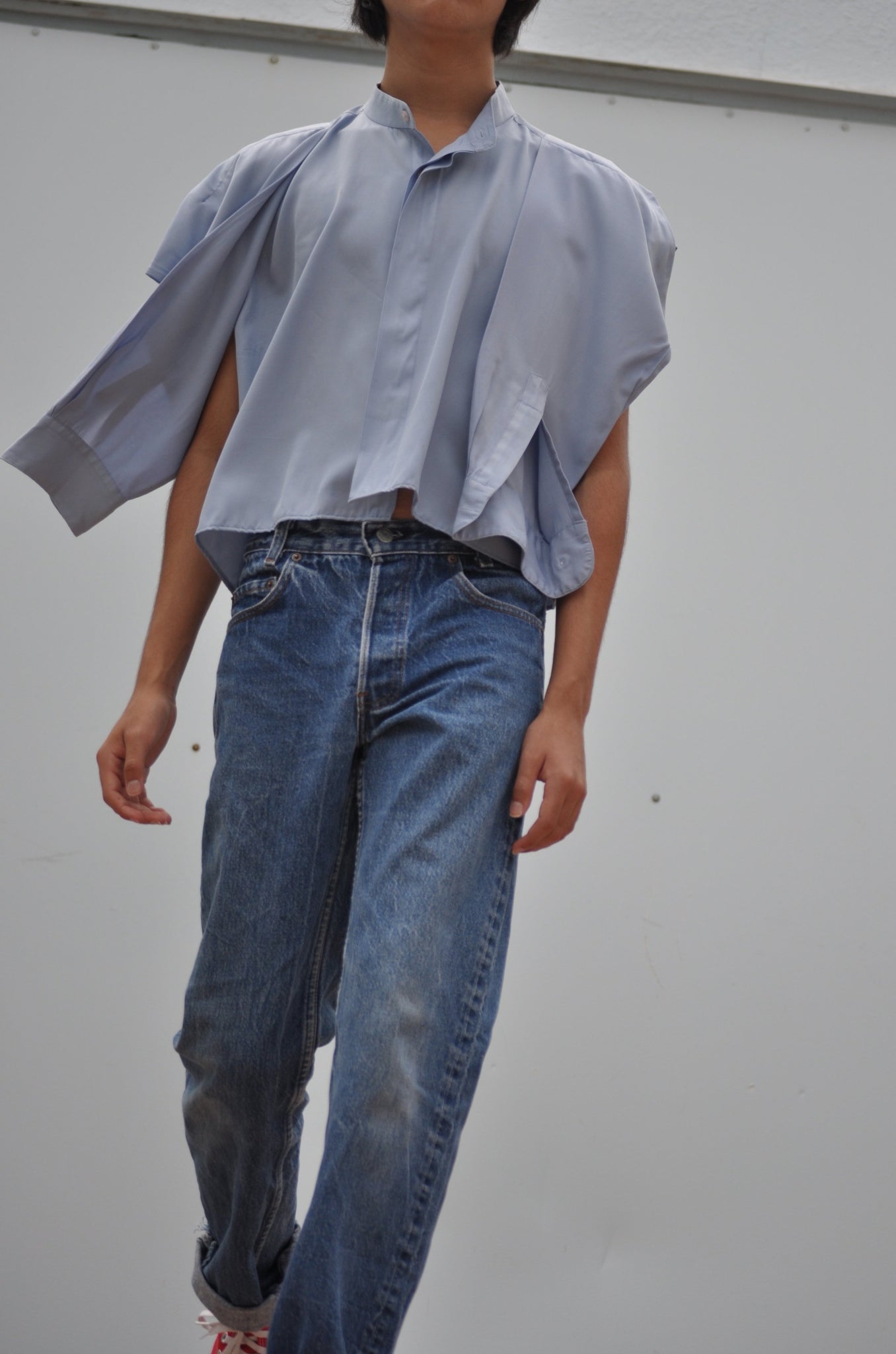 FRONT IMAGE OF RECONSTRUCTED BUTTON DOWN SHIRT.