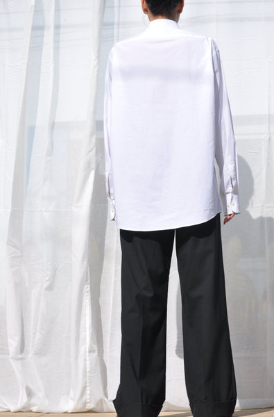 BACK IMAGE OF UNISEX WHITE SECONDHAND BUTTON DOWN SHIRT.