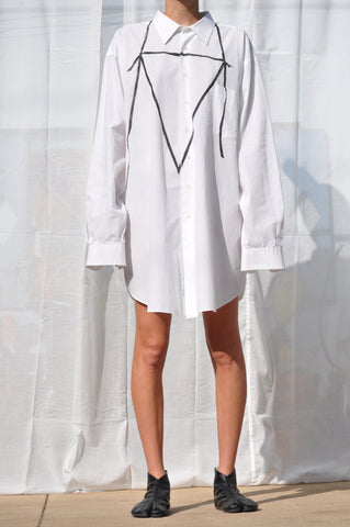 Oversized secondhand white button down shirt. Unique Hand painted tie detail at front. 