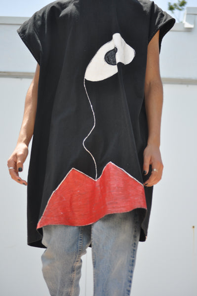 FRONT IMAGE OF PAINTED OVERSIZED TEE ON A MODE.