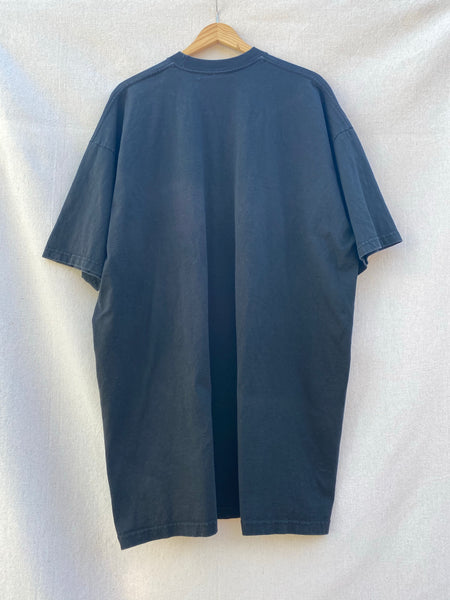 BACK IMAGE OF OVERSIZED BLACK TEE.