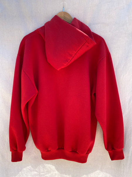 BACK VIEW OF RED LONG SLEEVE HOODIE.