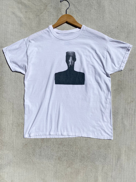 FRONT IMAGE OF SILK SCREENED WHITE T-SHIRT.