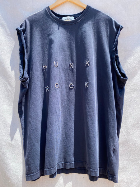 BRIGHT LIT FRONT VIEW OF MUSCLE TEE WITH PUNK ROCK EMBROIDERED ON IT.