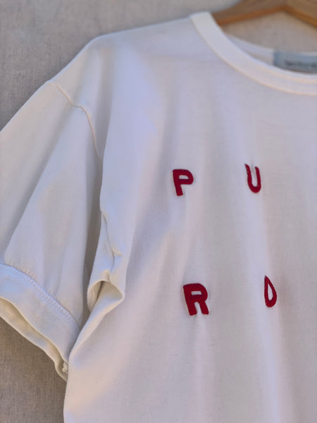 CLOSE UP VIEW OF PU RD EMBROIDERY