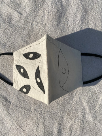 hand painted cotton face mask with adjustable ear loops.