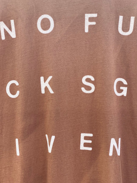 ZOOMED IN VIEW OF THE NOFUCKSGIVEN PRINT IN IVORY.
