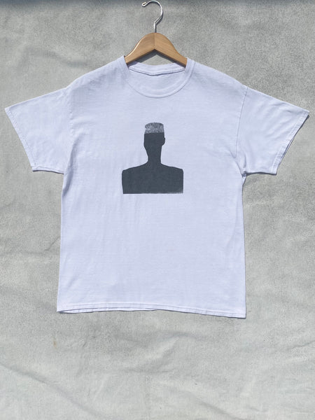 Front image of silk screened white tee in black
