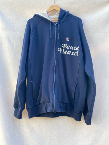 IMAGE OF FRONT NAVY HOODIE WITH PEACE PLEASE! EMBROIDERY AT TOP LEFT CORNER.